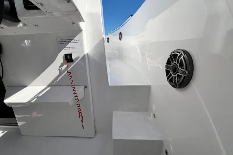 Slide: The Image of Interior of 2026 Fabbro F33 boat with speaker and safety features. - 14