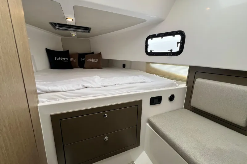 Slide: The Image of Luxurious cabin interior of 2026 Fabbro F33 yacht with bed and seating area. - 18