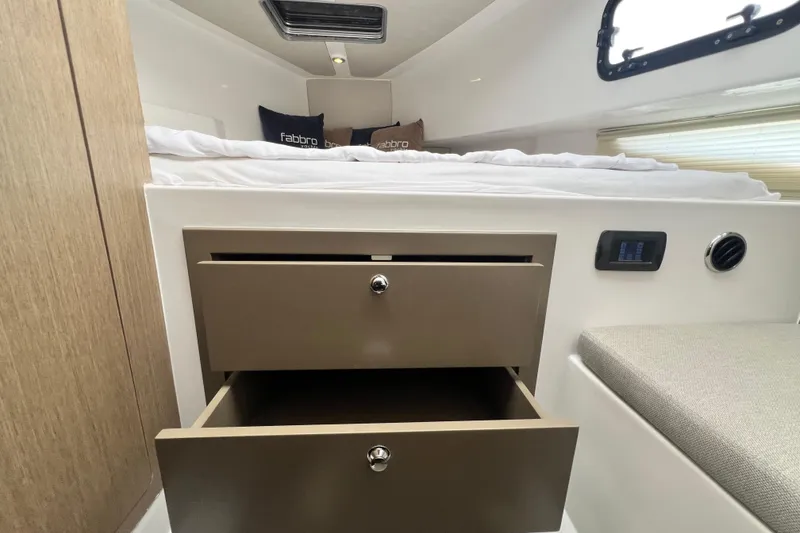 Slide: The Image of Interior of 2026 Fabbro F33 boat with bed, drawers, and modern design. - 21