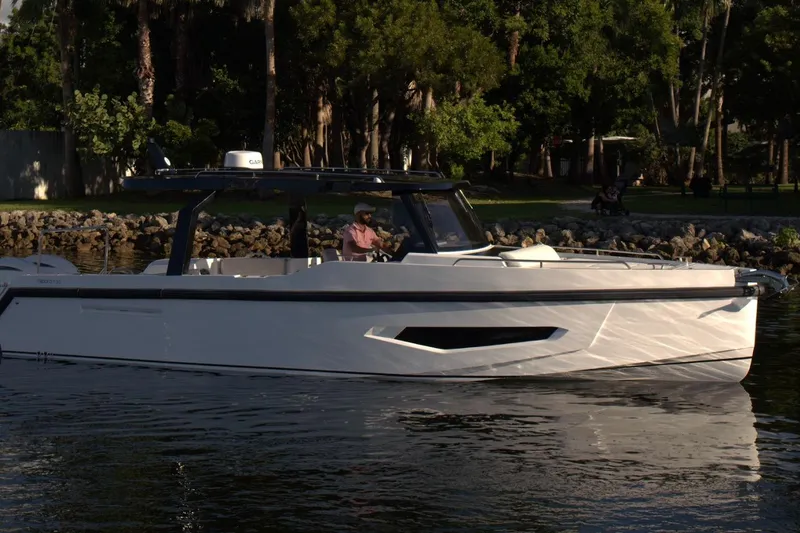 Slide: The Image of Fabbro F33 2026 boat in front of city skyline. - 4