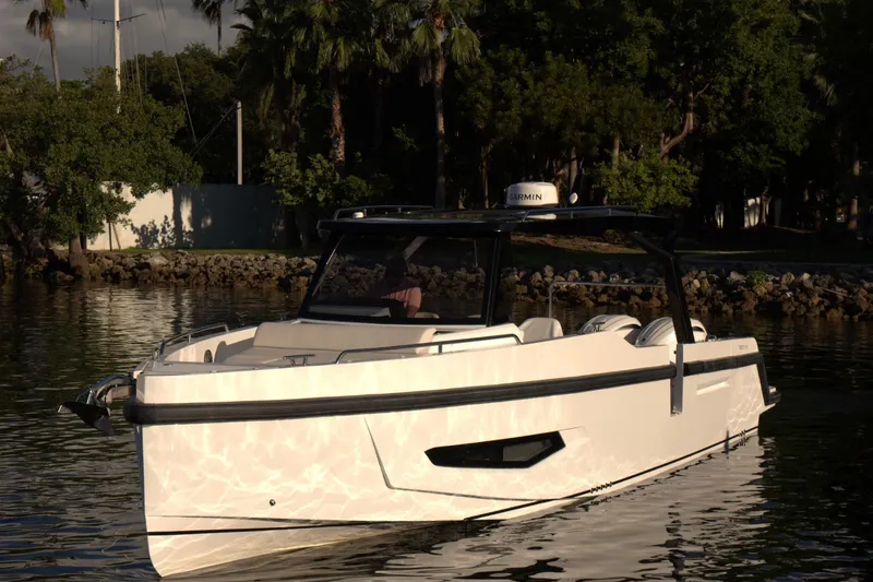 Slide: The Image of Aerial view of Fabbro F33 boat, 2026 model, on calm water. - 9