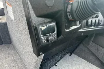 Slide: The Image of Interior of 2026 Lund 1975 Tyee boat with seating and storage compartment. - 12