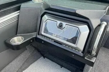 Slide: The Image of 2026 Lund 1975 Tyee boat interior with carpeted seating and motor view. - 13