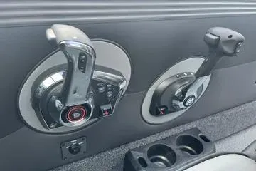 Slide: The Image of Interior of 2026 Lund 1975 Tyee boat with four seats and steering console. - 8