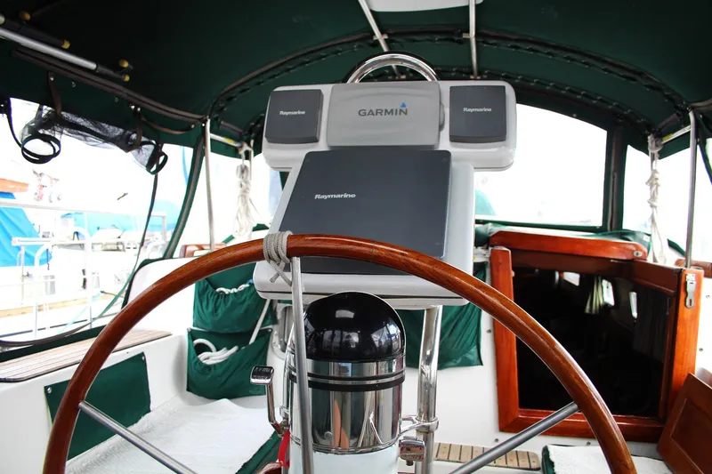 Slide: The Image of Cockpit of 1990 Slocum 43 sailboat with Garmin navigation equipment. - 8