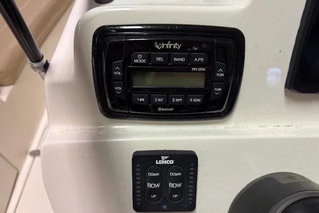 Slide: The Image of Control panel of 2020 NauticStar 2302 Legacy Dual Console with Infinity audio system. - 12