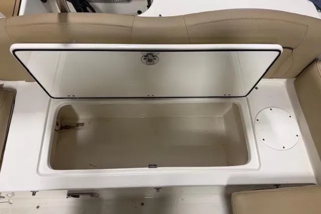 Slide: The Image of NauticStar 2302 Legacy 2020 seat with storage compartment. - 30