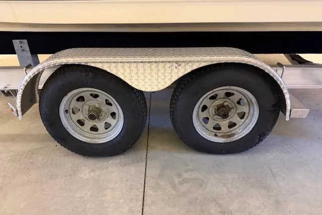 Slide: The Image of Trailer wheels for 2020 NauticStar 2302 Legacy Dual Console boat. - 42