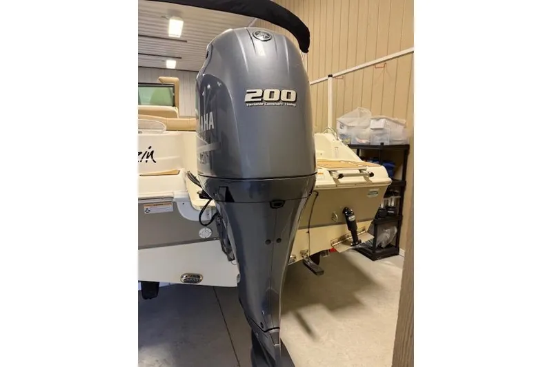 Slide: The Image of 2020 NauticStar 2302 Legacy Dual Console with Yamaha 200 outboard engine. - 6