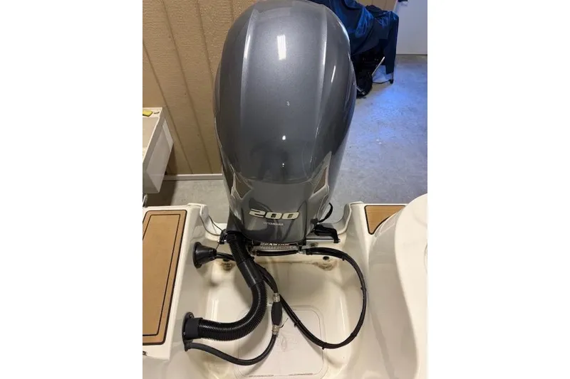 Slide: The Image of 2020 NauticStar 2302 Legacy Dual Console with Yamaha 200 outboard motor. - 7