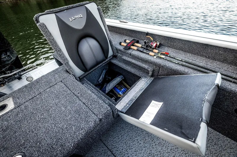 Slide: The Image of 2026 Lund 1775 Impact XS SS boat interior with four cushioned seats. - 10