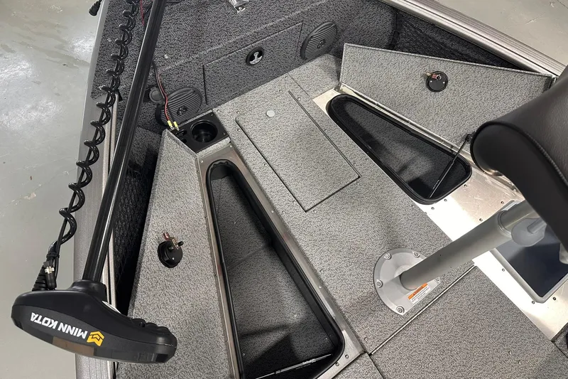 Slide: The Image of 2026 Lund 1775 Impact XS SS boat interior with Minn Kota trolling motor. - 23
