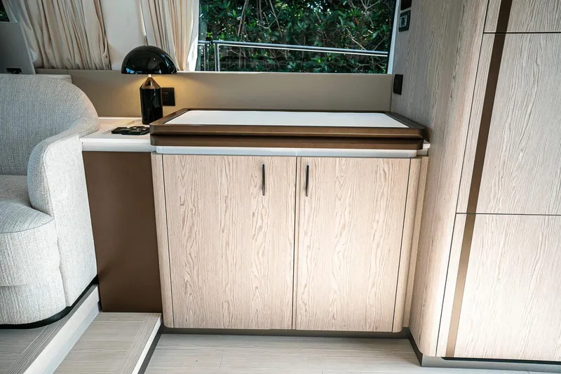Slide: The Image of Interior of 2026 Azimut Fly 53 yacht with modern cabinetry and sleek design. - 10