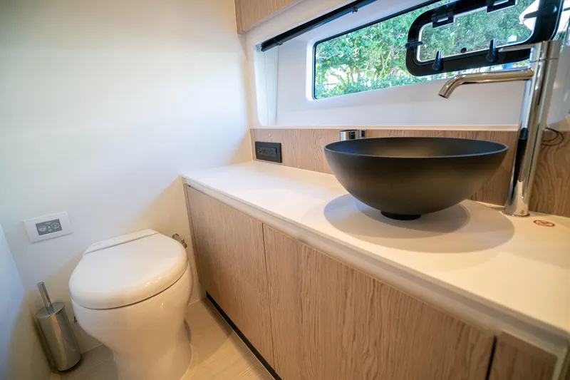 Slide: The Image of Modern bathroom in 2026 Azimut Fly 53 yacht with sleek fixtures and window view. - 22