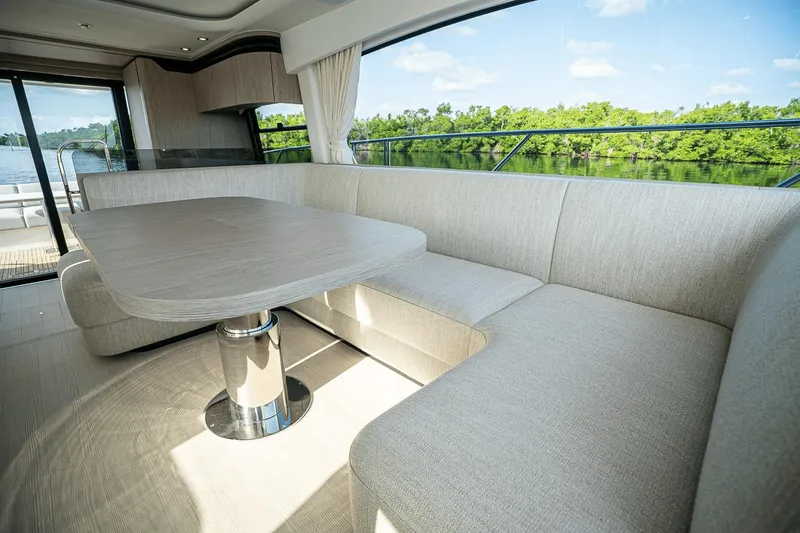 Slide: The Image of Luxurious interior of 2026 Azimut Fly 53 yacht with elegant seating and scenic view. - 31