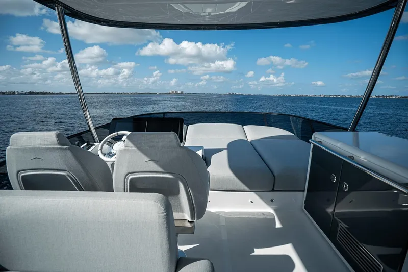Slide: The Image of Luxurious 2026 Azimut Fly 53 yacht interior with ocean view and modern seating. - 35