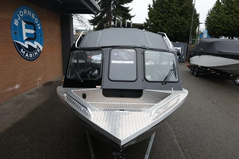Slide: The Image of 2026 Thunder Jet 210 Luxor Limited boat at Bjornson Marine dealership. - 14