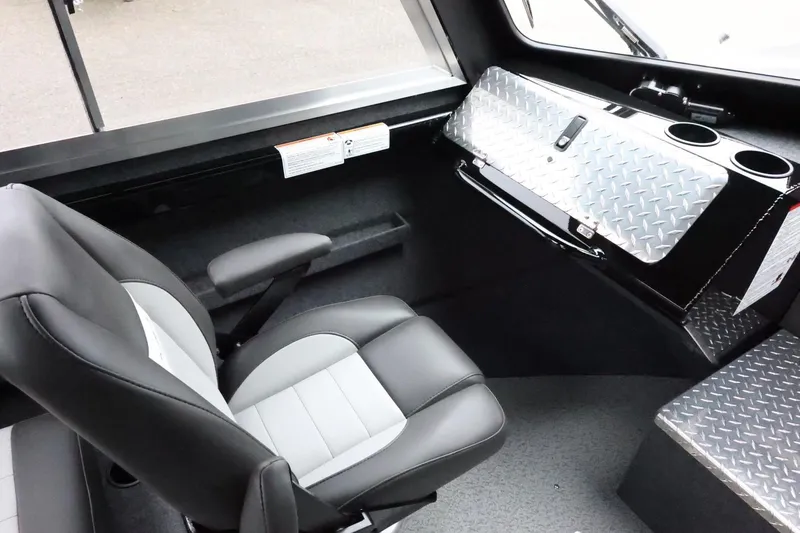 Slide: The Image of Interior of 2026 Thunder Jet 210 Luxor Limited boat with seating and storage. - 19