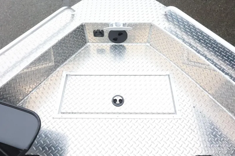 Slide: The Image of 2026 Thunder Jet 210 Luxor Limited boat deck with diamond plate finish. - 22