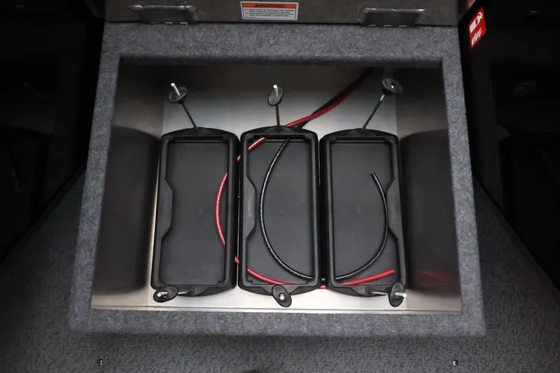 Slide: The Image of Battery compartment of 2026 Thunder Jet 210 Luxor Limited boat, featuring secure wiring setup. - 24