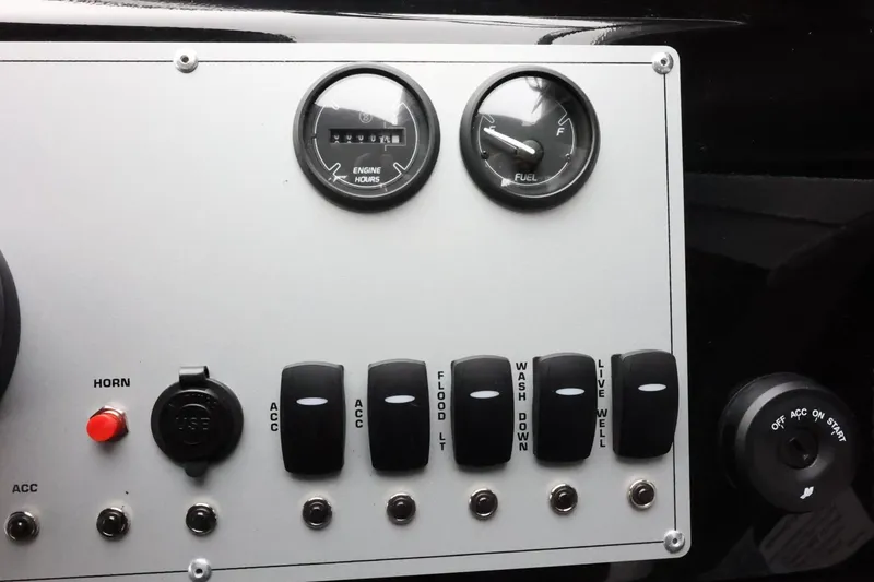 Slide: The Image of Control panel of 2026 Thunder Jet 210 Luxor Limited with gauges and switches. - 26