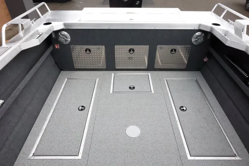 Slide: The Image of 2026 Thunder Jet 210 Luxor Limited boat interior with storage compartments and sleek design. - 35