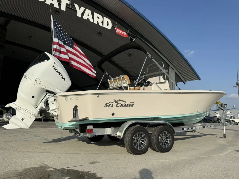 Slide: The Image of 2026 Sea Chaser 23 LX boat with Honda engine and trailer. - 7
