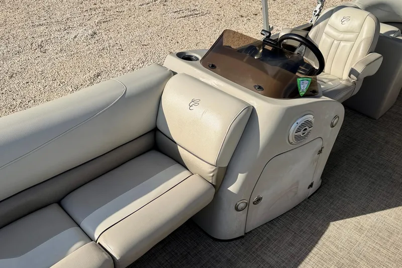 Slide: The Image of Steering console of 2022 Cypress Cay Seabreeze 232 pontoon boat with gauges and controls. - 15