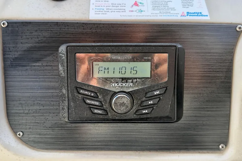 Slide: The Image of 2022 Cypress Cay Seabreeze 232 interior with seating and storage compartment. - 22