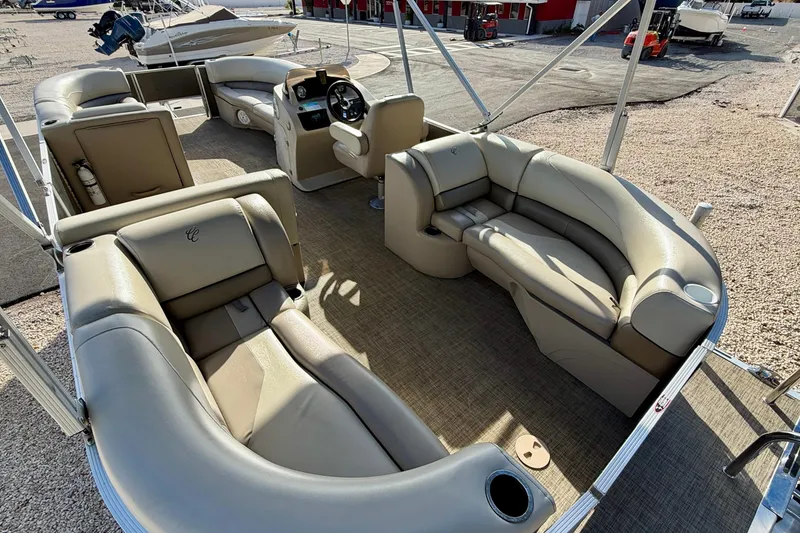 Slide: The Image of 2022 Cypress Cay Seabreeze 232 with Mercury 115 outboard engine, rear view. - 25