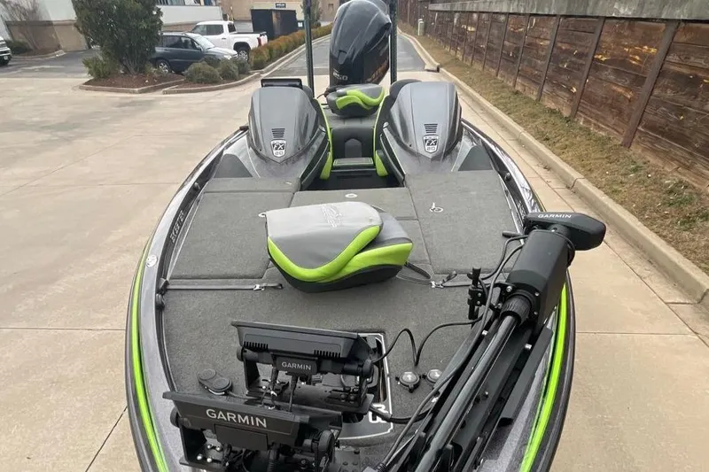 Slide: The Image of 2016 Skeeter FX20 Limited Edition boat with Garmin equipment, parked outdoors. - 2