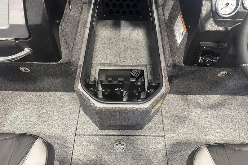 Slide: The Image of Interior of 2026 Lund 1875 Pro-V boat showing console and seating area. - 19