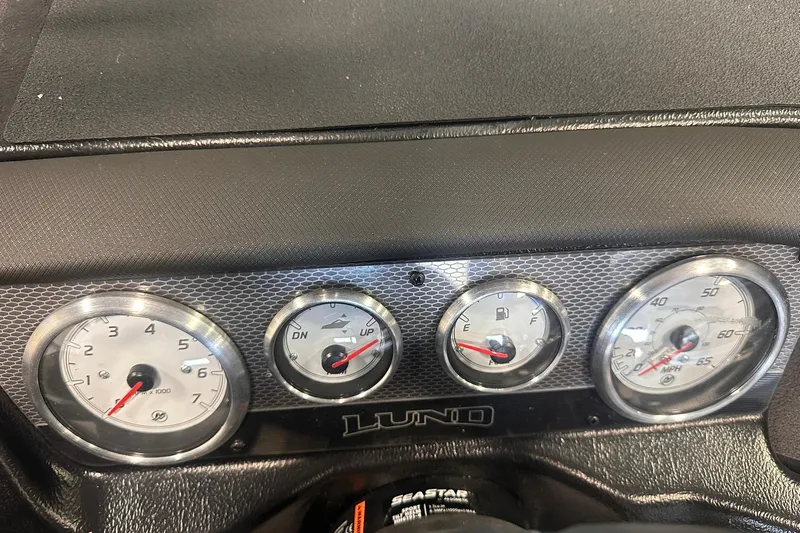 Slide: The Image of Dashboard of 2026 Lund 1875 Pro-V boat with gauges and controls. - 22