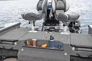 Slide: The Image of 2026 Lund 1875 Pro-V boat interior with comfortable seating and modern design. - 8