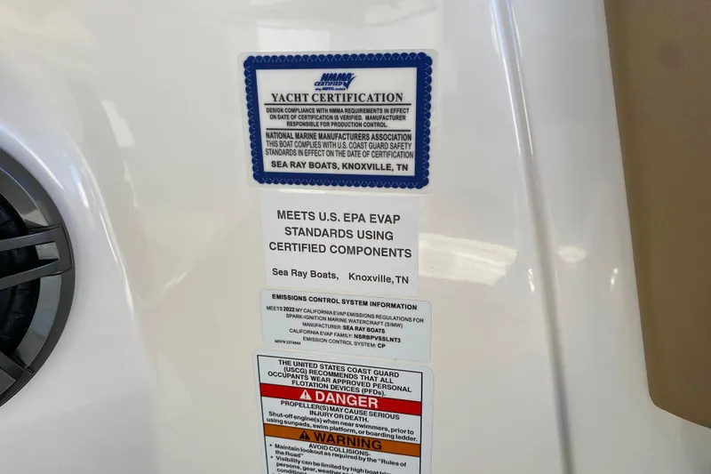 Slide: The Image of 2022 Sea Ray SDX 270 Outboard yacht certification and safety compliance labels. - 20