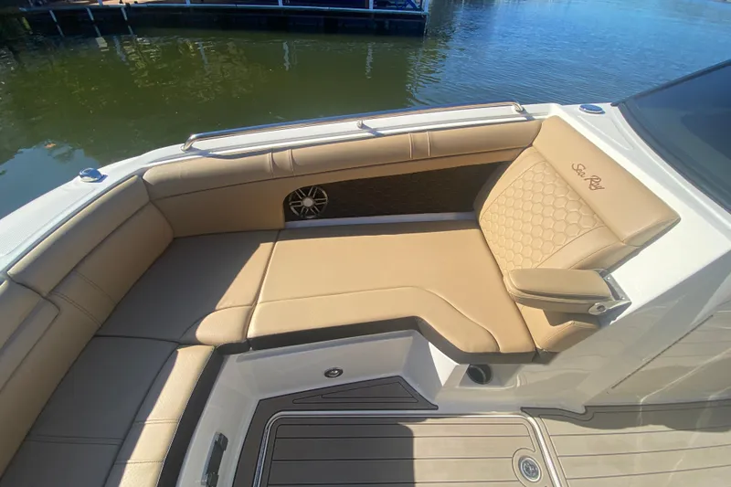 Slide: The Image of 2022 Sea Ray SDX 270 Outboard boat with tan seating and elegant design. - 28