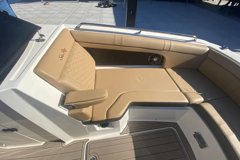 Slide: The Image of 2022 Sea Ray SDX 270 Outboard boat with luxurious tan seating and stylish design. - 29