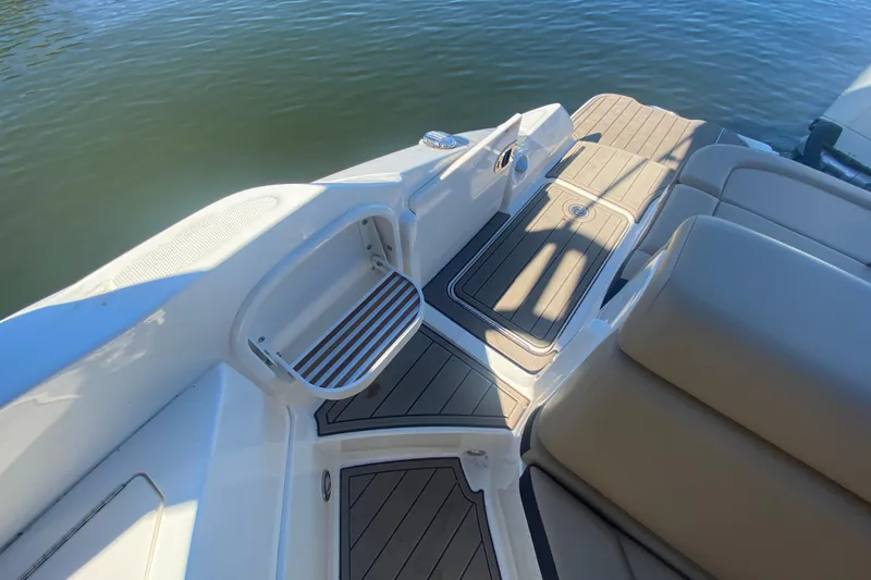 Slide: The Image of 2022 Sea Ray SDX 270 Outboard boat interior with seating and deck view. - 32