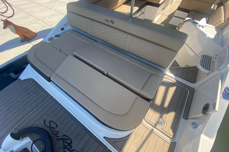 Slide: The Image of 2022 Sea Ray SDX 270 Outboard boat with tan seating and deck. - 34