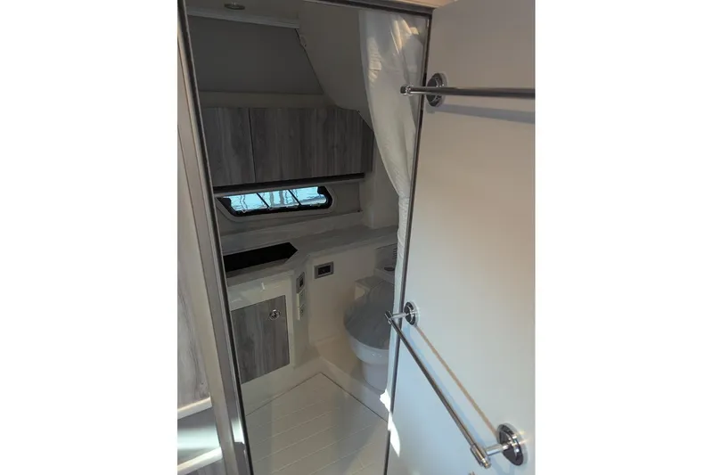 Slide: The Image of 2024 Formula 430 Super Sport Crossover bathroom interior with modern design and fixtures. - 24