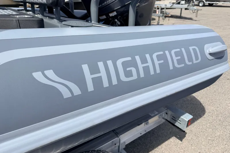 Slide: The Image of 2026 Highfield Sport 520 boat, close-up of branding on the side. - 11