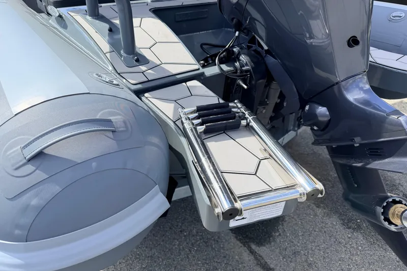 Slide: The Image of Highfield Sport 520 boat, 2026 model, featuring a sleek design with a foldable ladder. - 12