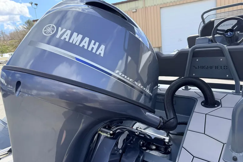 Slide: The Image of 2026 Highfield Sport 520 with Yamaha outboard motor, showcasing sleek design and advanced features. - 7