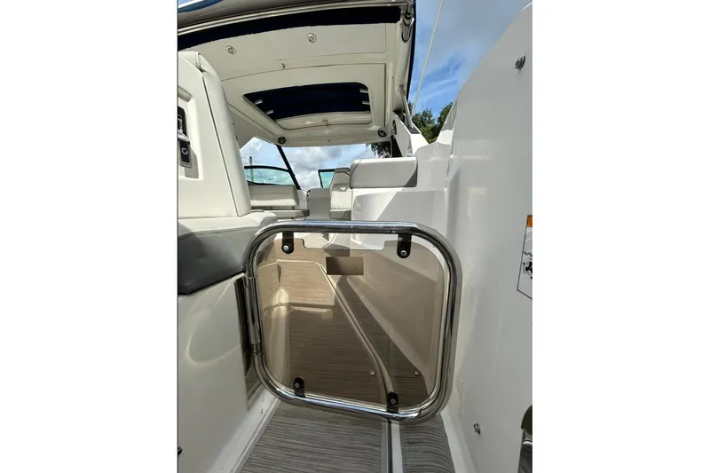 Slide: The Image of Interior view of 2020 Sea Ray Sundancer 320 yacht, featuring sleek design and modern amenities. - 24