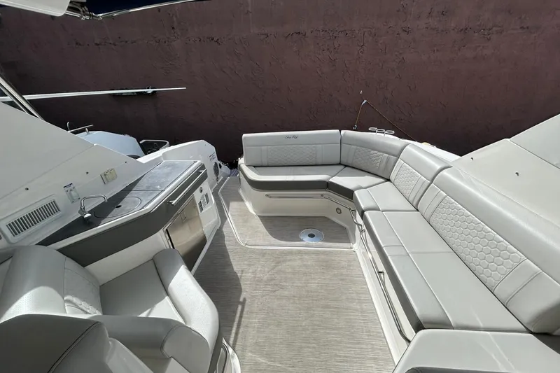 Slide: The Image of Luxurious interior of 2020 Sea Ray Sundancer 320 yacht with spacious seating and kitchenette. - 5