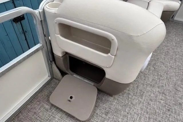 Slide: The Image of 2004 Sun Tracker Party Barge 22 Regency Edition interior with storage compartment. - 12