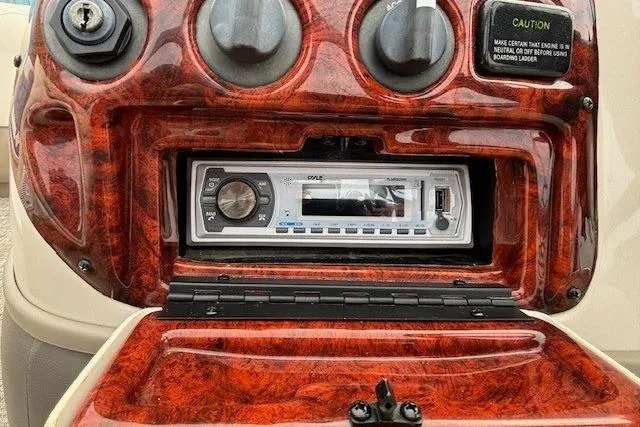 Slide: The Image of Dashboard of 2004 Sun Tracker Party Barge 22 Regency Edition with stereo system. - 16