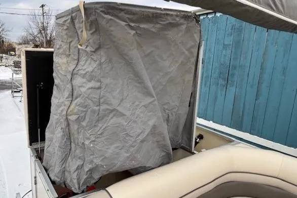 Slide: The Image of 2004 Sun Tracker Party Barge 22 Regency Edition with covered seating area. - 22