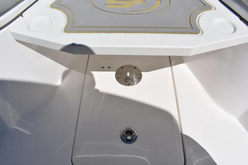 Slide: The Image of 2021 Sea Fox 268 Commander boat deck with storage compartment and cup holders. - 16