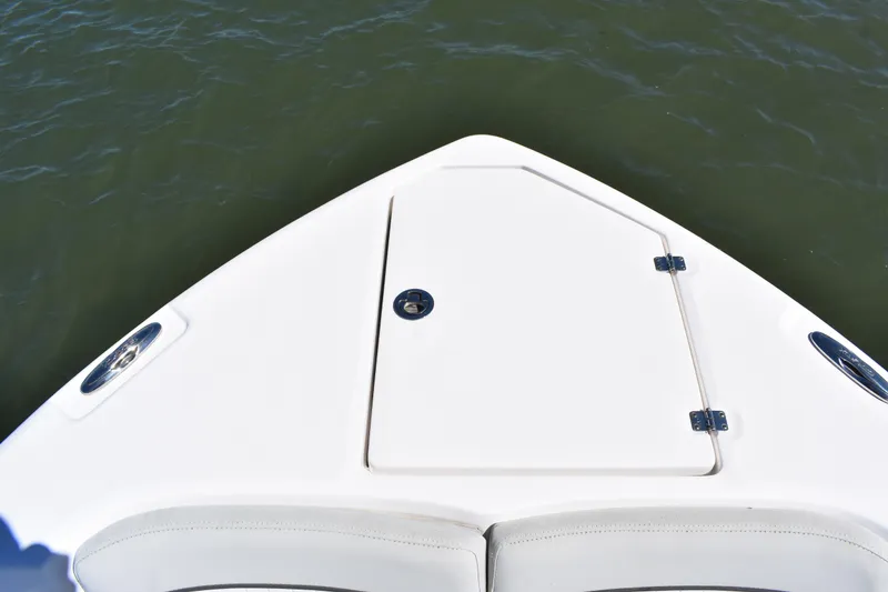 Slide: The Image of Bow of 2021 Sea Fox 268 Commander boat on water, featuring storage hatch. - 18